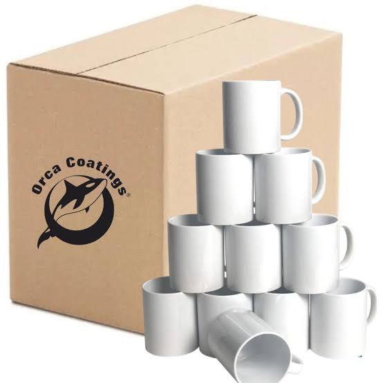A box of ceramic mugs